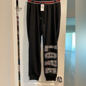 Love sequin black,red and white joggers size 10/12 by Ashley Stewart